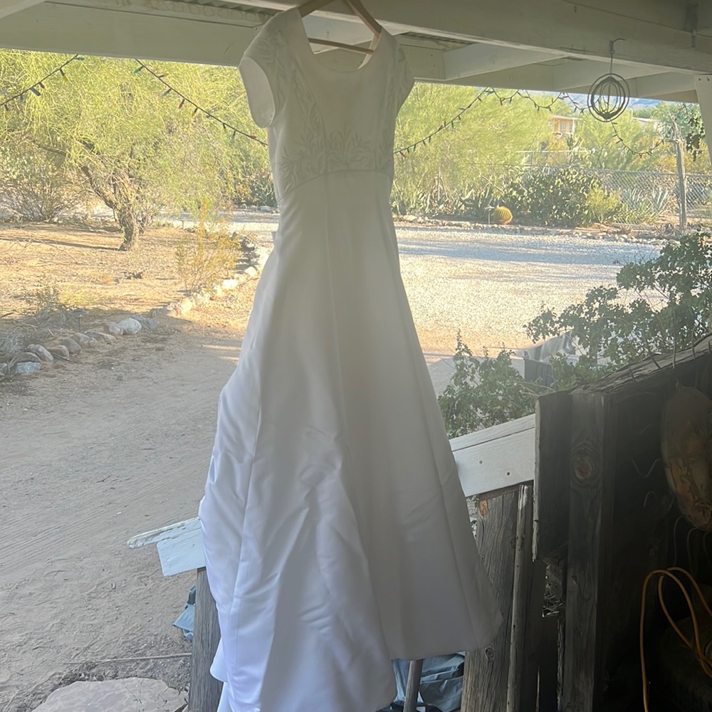 White wedding dress size twelve with bustle